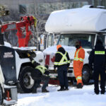 Canadian police arresting protesters, towing rigs in Ottawa