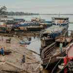 In Congo, Floating Pastors Follow Mobile Flocks Along Busy River