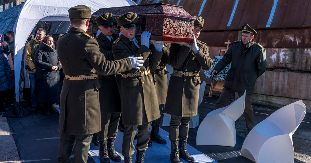 In Kyiv, a Soldier’s Funeral and Vows of Defiance