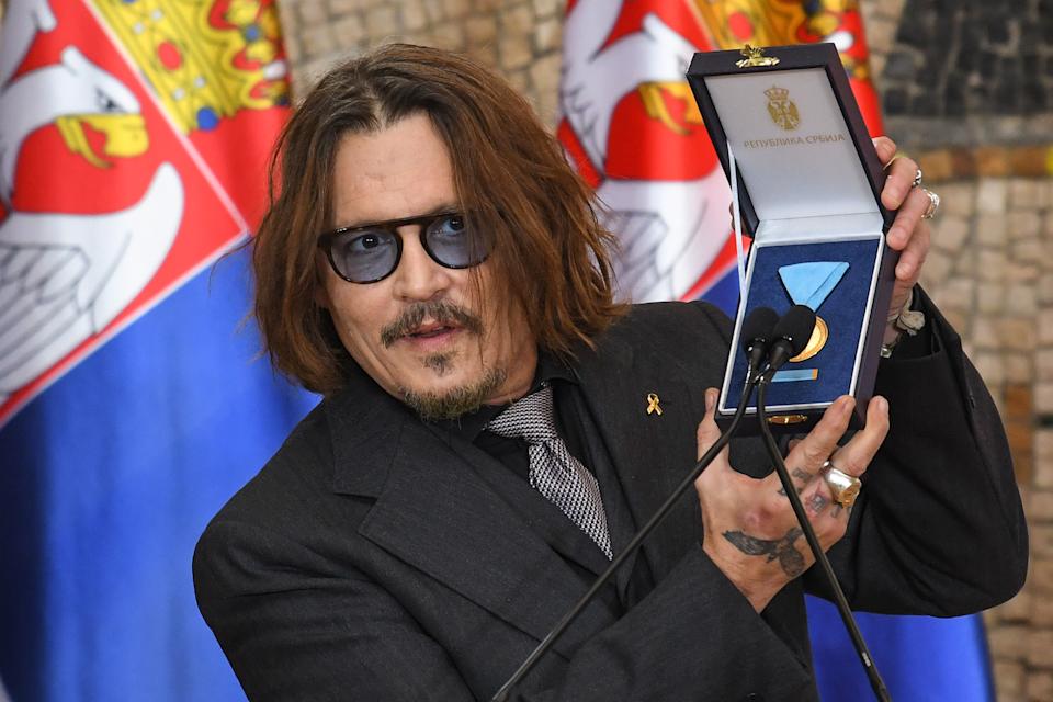 Johnny Depp says he’s ‘on the verge of a new life’ as he accepts medal from Serbian president