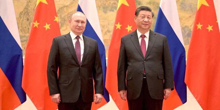 Putin and Xi accuse NATO of having a Cold War ideology as Russia threatens a former Soviet republic with war