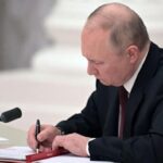 Putin signs treaties giving Russia the right to build military bases in separatist regions of Ukraine