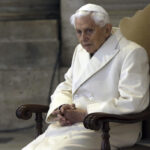 Retired pope asks pardon for abuse, but admits no wrongdoing