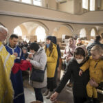 Across Europe, Ukrainian exiles pray for peace back home