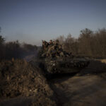 AP PHOTOS: Day 33: Volunteers rally to aid of Ukraine army