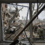 AP PHOTOS: Day 7, Ukrainians feeling weight of war