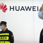 China’s Huawei says 2021 sales down, profit up