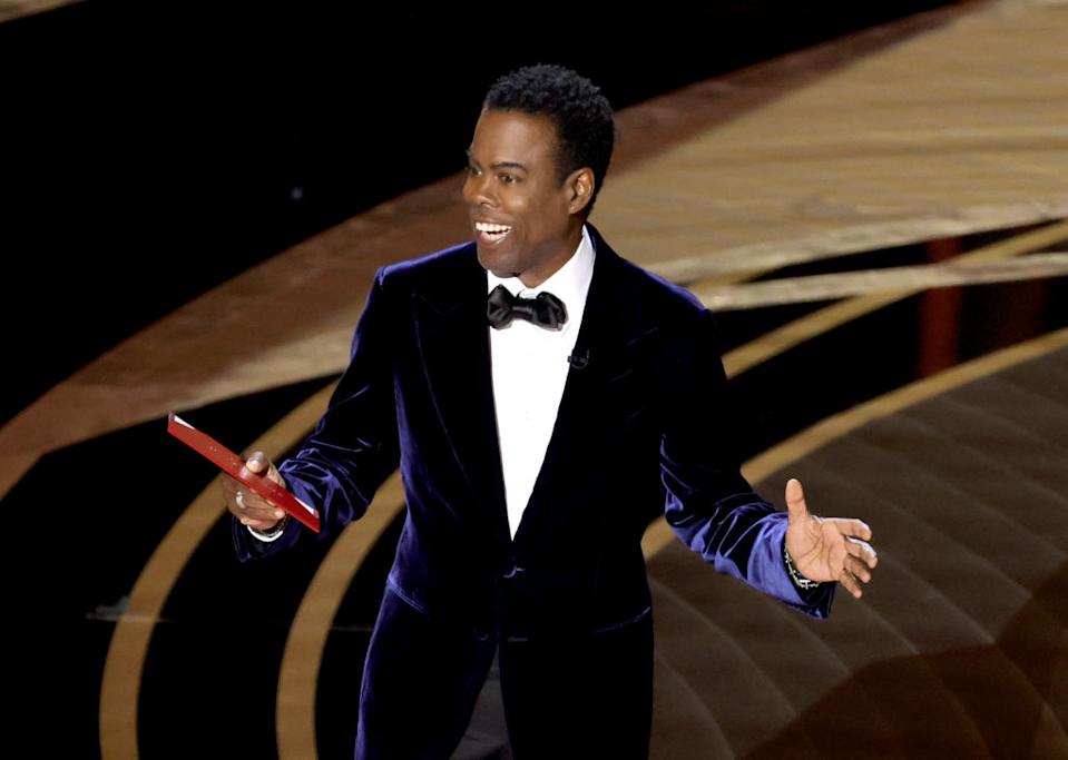 Chris Rock receives a standing ovation at his first comedy show since the Oscars