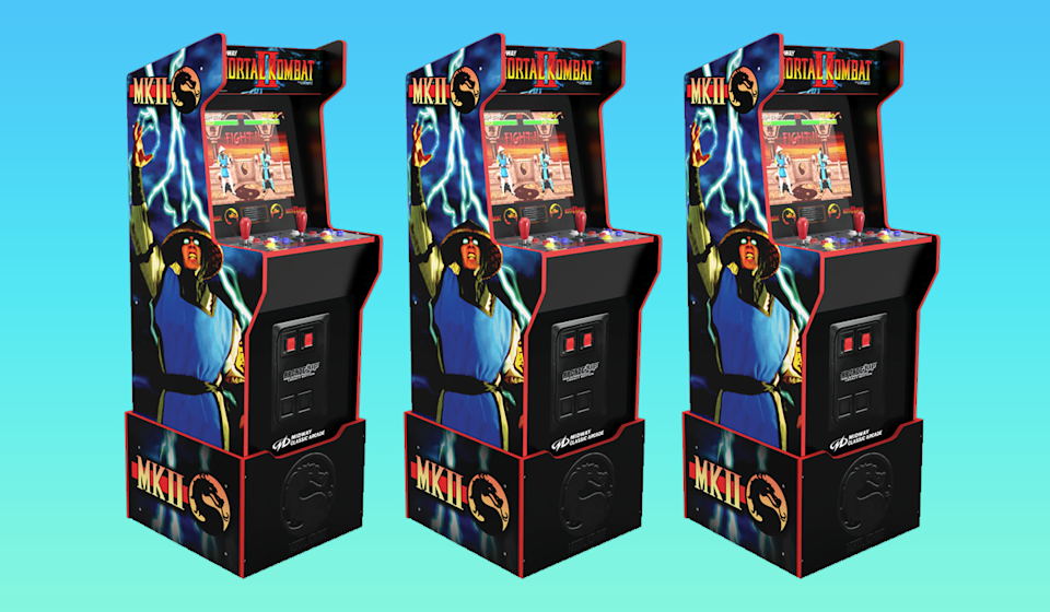 Finish him! This Mortal Kombat arcade-style game machine is  off