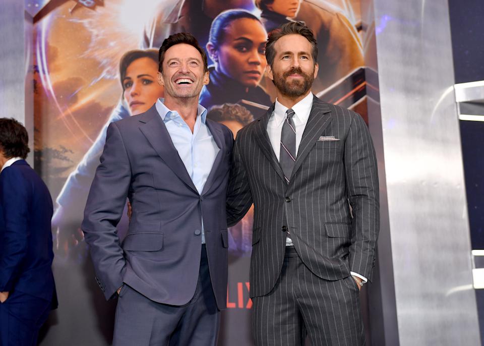 Kid reporters scold ‘The Adam Project’ star Ryan Reynolds for being mean to Hugh Jackman