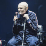 Phil Collins remains seated during Berlin concert months after revealing he can no longer play the drums