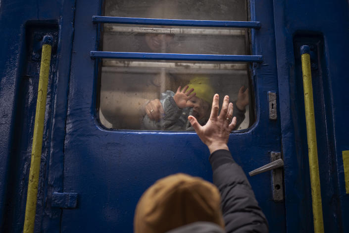 Photos: Ukraine families say goodbye as they are separated by war