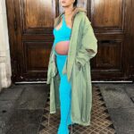 Pregnant Rihanna Shows Off Baby Bump in Skintight Aqua Jumpsuit at Paris Fashion Week: ‘Thicc’