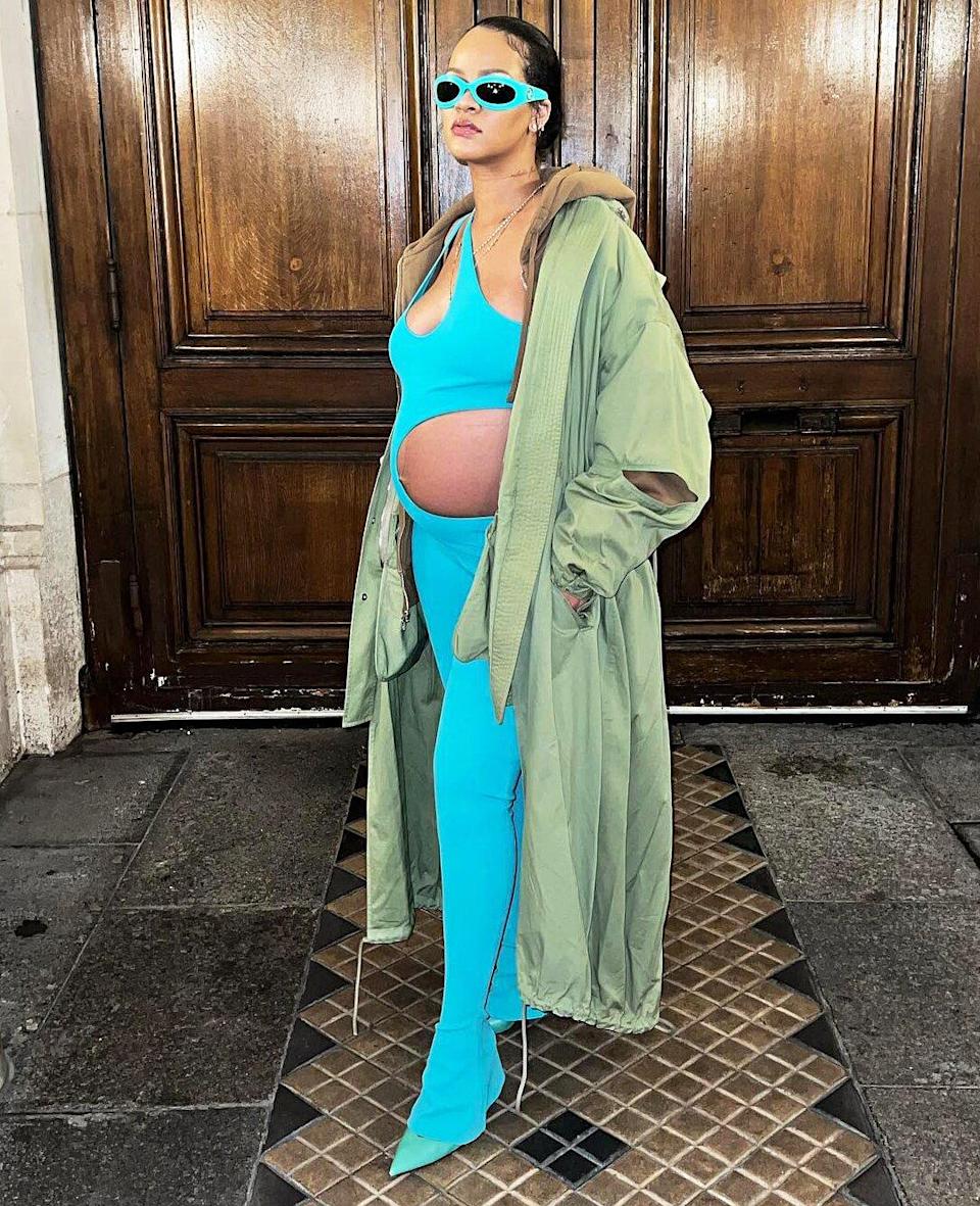 Pregnant Rihanna Shows Off Baby Bump in Skintight Aqua Jumpsuit at Paris Fashion Week: ‘Thicc’