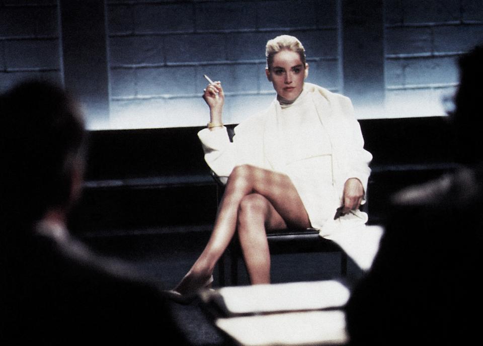 Sharon Stone and Paul Verhoeven remember the infamous ‘Basic Instinct’ interrogation room scene differently. Here’s why.