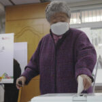 South Koreans vote for president in tight, bitter election