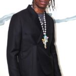 Travis Scott Performs at Star-Studded Pre-Oscars Party—His First Gig Since Astroworld Tragedy