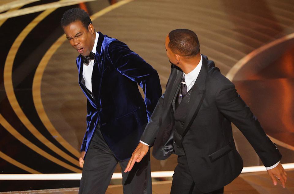 Will Smith hits Chris Rock on stage at the Oscars after Jada Pinkett Smith joke