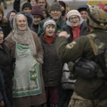 AP PHOTOS on Day 38: Retreating troops leave devastation