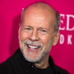 Bruce Willis goes biking with daughters after aphasia announcement