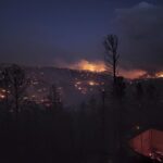 Destructive wildfires rage in New Mexico, Colorado