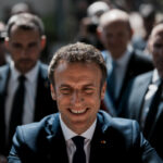 France’s youngest president wins again, troubles and all