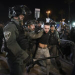 Israel police arrest 8 in third night of Jerusalem unrest