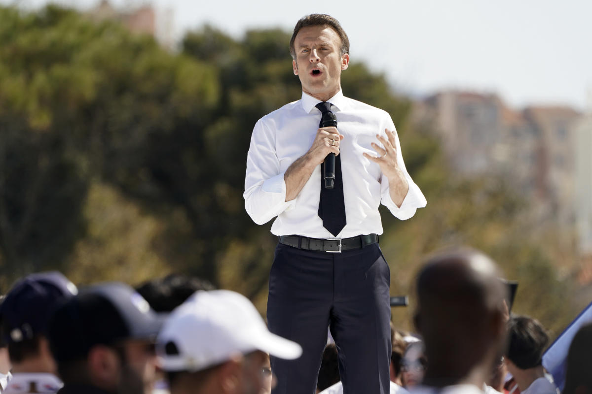 Macron courts Marseille voters; climate activists in Paris