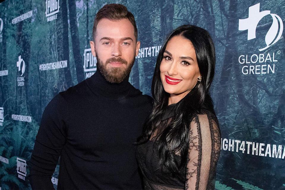 Nikki Bella Explains Why She Defends Her Long Engagement to Artem Chigvintsev: ‘I Feel Like I Have To’