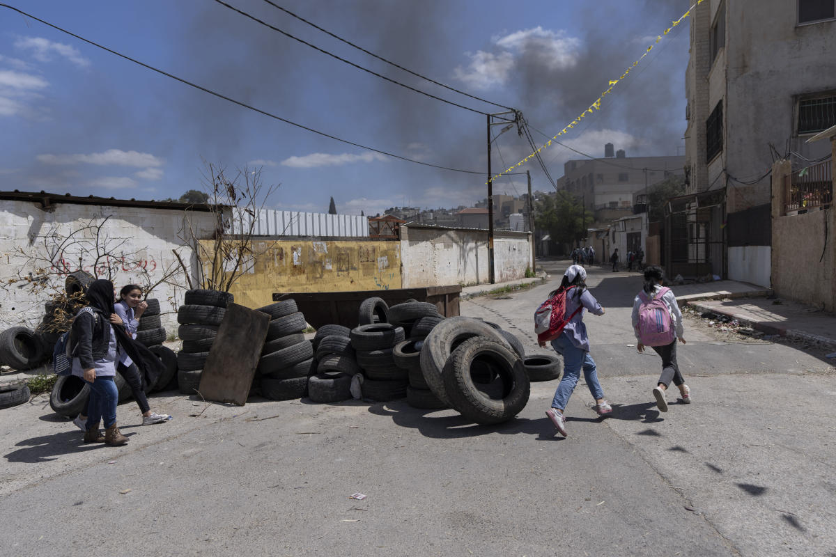 Palestinians in Jenin evoke painful past as violence flares