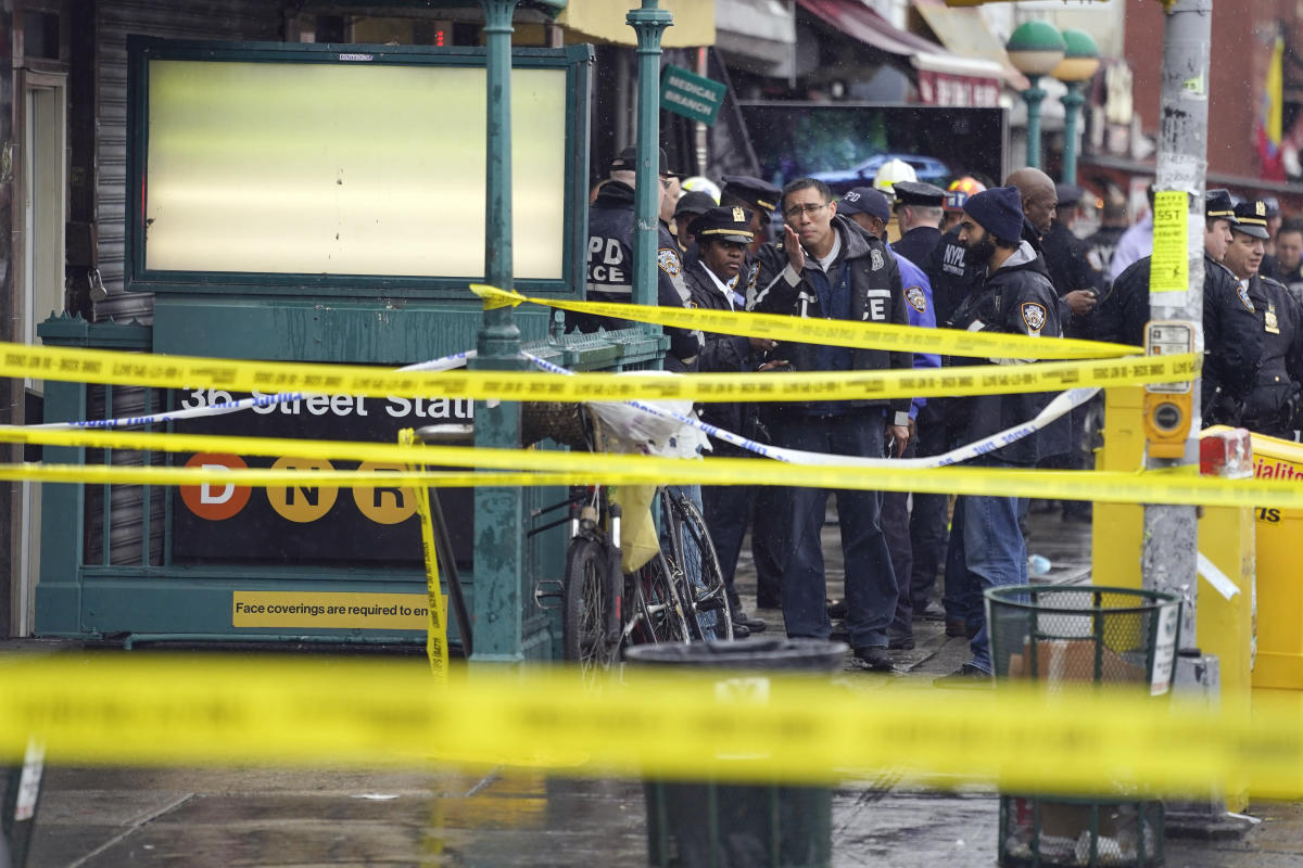 Police hunt gunman who wounded 10 in Brooklyn subway attack