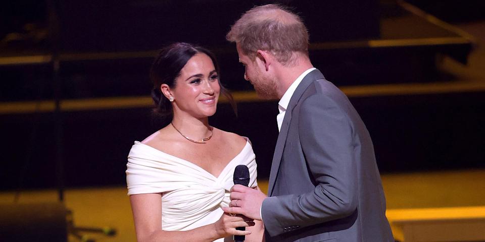 Prince Harry and Meghan Markle share this sweet moment onstage at Invictus Games