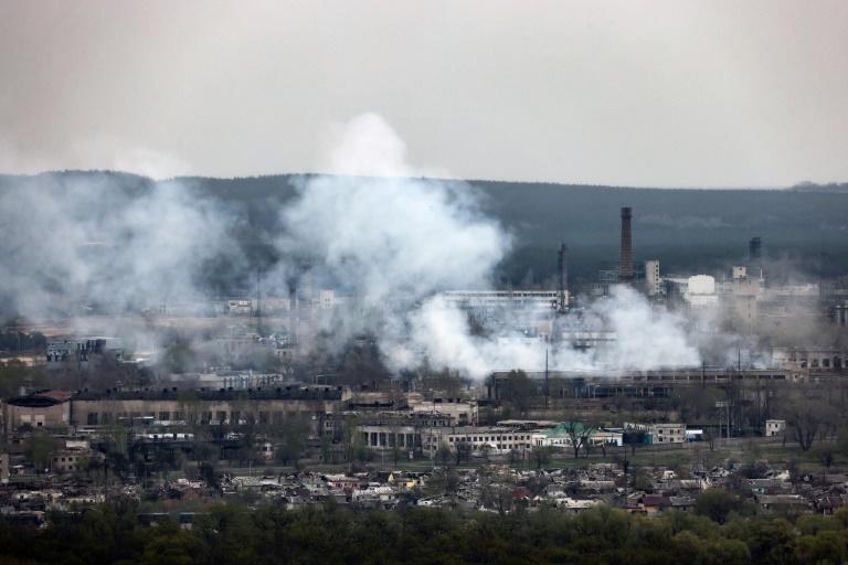 Putin honours brigade accused of atrocities as strikes hit western Ukraine