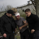 Russia hits Ukrainian cities, pours more troops into war