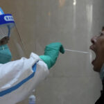 Shanghai wrestles with food shortages under virus shutdown