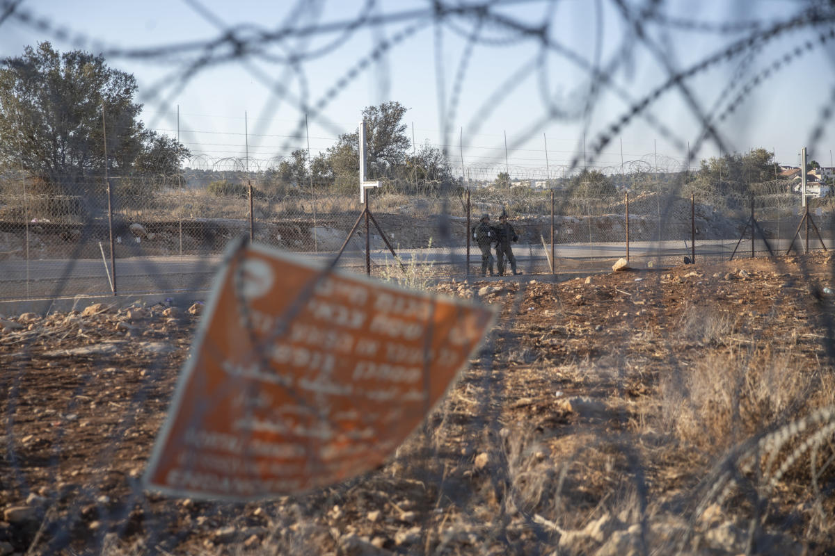 Two Palestinians wounded by Israeli troops in West Bank raid