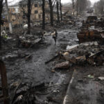 Ukraine accuses Russia of massacre, city strewn with bodies