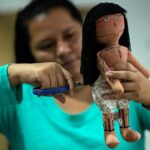 A doll brings pride, identity for Brazil Indigenous woman