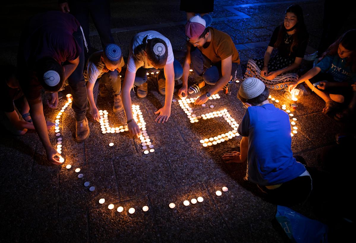 A year after disaster, thousands flock to Israeli holy site