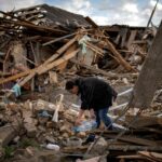 AP PHOTOS: Hope amid a few surviving flowers in Ukraine city