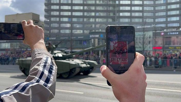 Artwork containing Ukrainian blood live-streamed as Putin’s tanks roll through Red Square