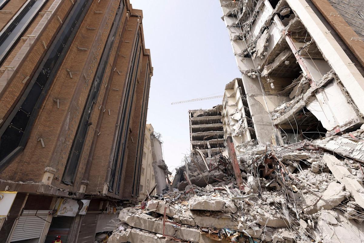 Building collapse death toll in southwest Iran rises to 26