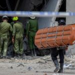 Havana hotel death toll at 31 as dogs search for survivors