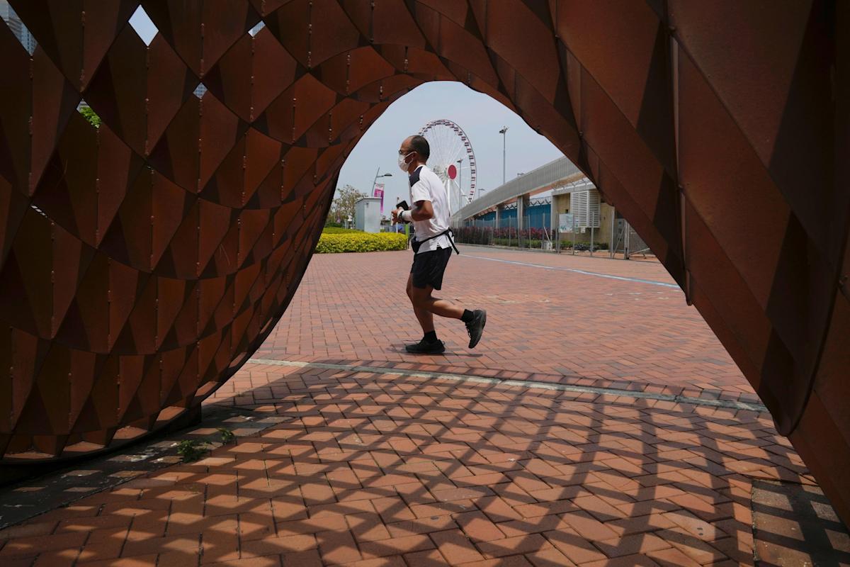 Hong Kong reopens beaches, Beijing relaxes quarantine rules