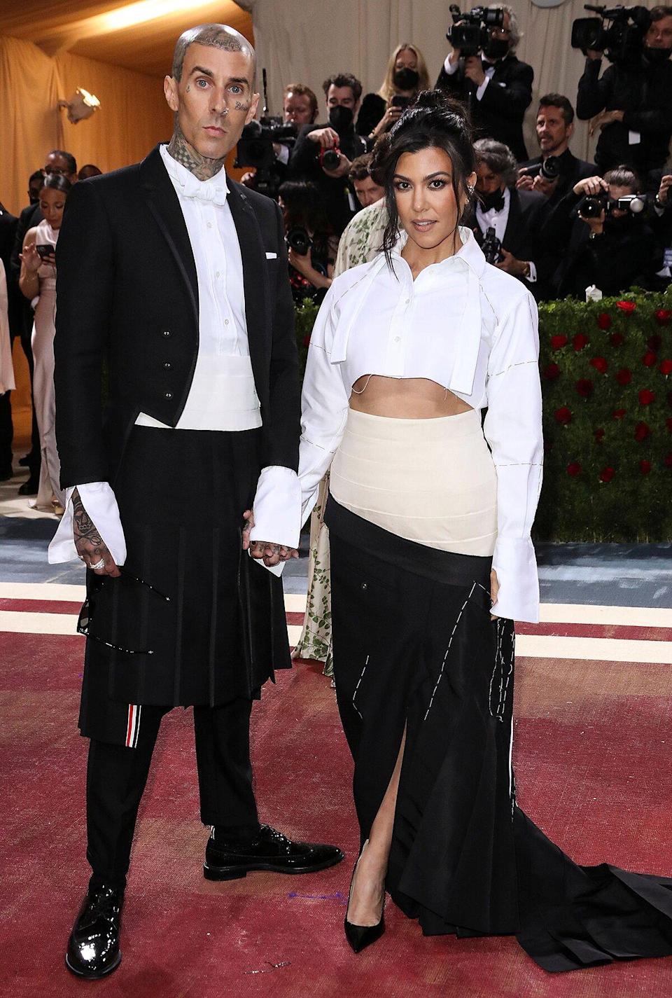 Kourtney Kardashian and Fiancé Travis Barker Wear Matching Skirts for Their Met Gala Debut