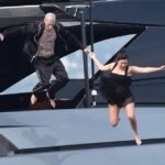 Kourtney Kardashian and Travis Barker Take a Lovers’ Leap from a Superyacht One Day After Their Wedding