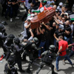 Latest Updates: Israeli Police Attack Mourners at Palestinian Journalist’s Funeral