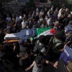 Palestinians mourn slain Al Jazeera journalist, blame Israel