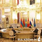 Russian state media shows off Putin’s new ‘long but round’ table at the Kremlin