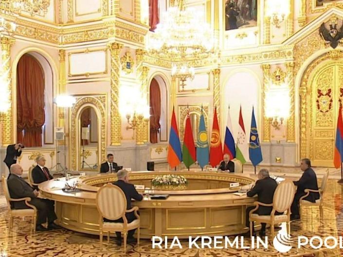 Russian state media shows off Putin’s new ‘long but round’ table at the Kremlin